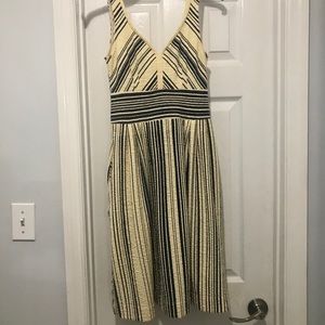 Strapless V neck and back dress.